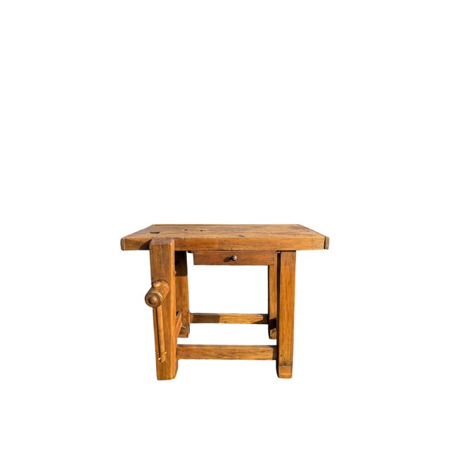 Vintage French children’s carpenter’s workbench from the 1950s. Made from solid beech and featuring a wooden vice, a...