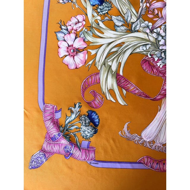 Hermes Regina silk scarf, 1988. This scarf depicts a large bouquet of various flowers, ranging from thistles and peonies...