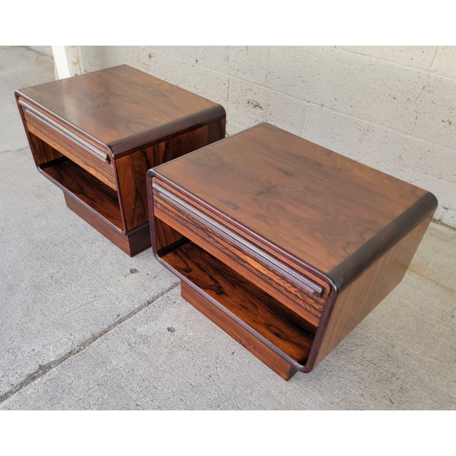 A fine pair of Scandinavian Modern rosewood nightstands by Westnofa. Made in Norway circa. 1960's. Exceptional original...