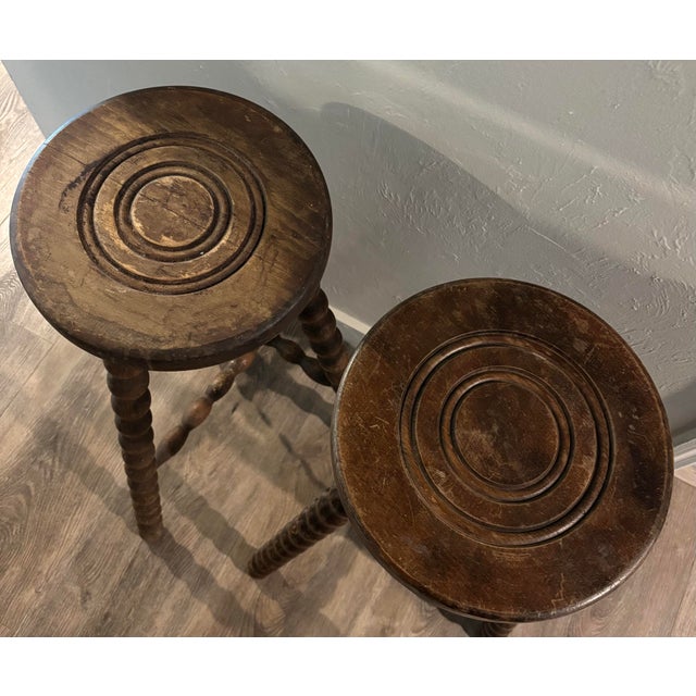 Full of character and sculptural charm, this pair of vintage French tabouret stools offers both decorative interest and...