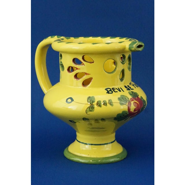 Item : Majolica ceramic jug, entirely hand-shaped on a lathe, then glazed and decorated entirely by hand with a floral...