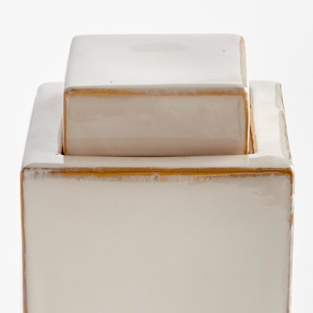 With its sleek lines, contemporary design and reactive glaze, this lidded jar is perfect for both modern and traditional...