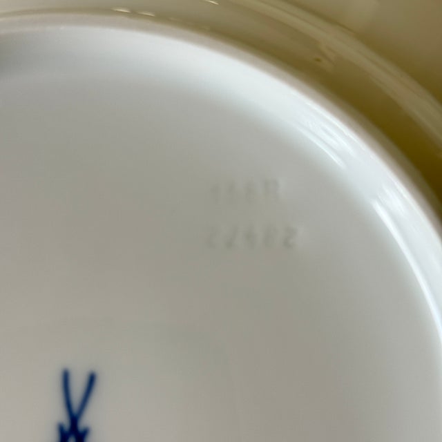 Series: Wave Pattern Decoration: Blue Flower Material: Porcelain Dimensions approx. D= 22 cm This piece has an attribution...