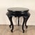 A mid 19th Century Chinese black lacquer center table with a green stone inset top. Standing on 5 cabriole legs, ending in...