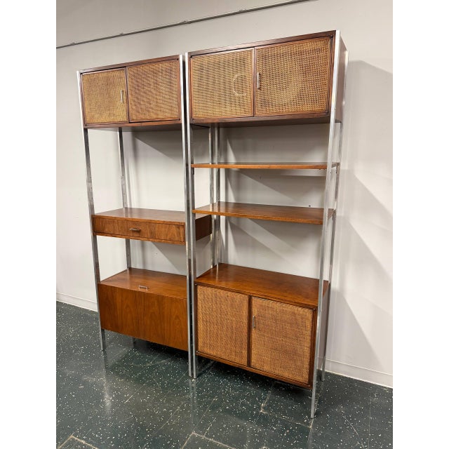 Exceptional vintage Mid-Century Modern two-section wall system by Founders Furniture, combining architectural design,...