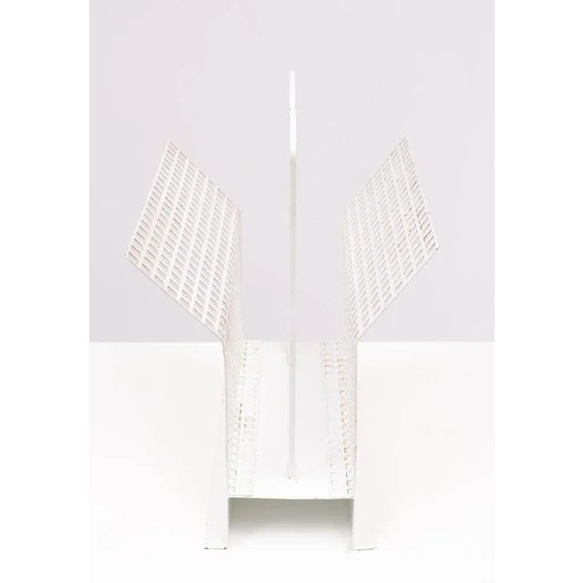 So simple can it be. Just at sheet off perforated metal. Folding on. The right places and dare it is a stylish newspaper...