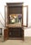 Traditional wooden china cabinet prioritizing clean lines and a functional geometric appearance. Small lower cabinet with...