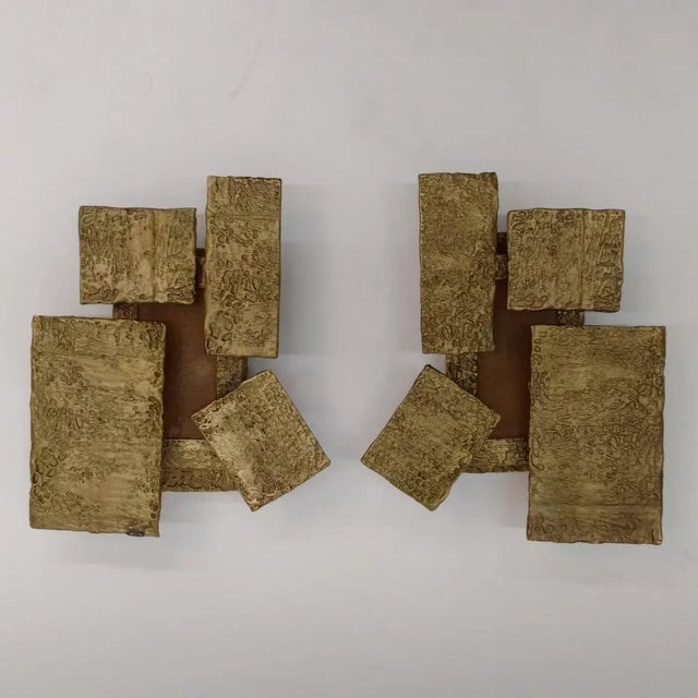 Spark Interior is proud to present Claudio Gonzalez. The brutalist style "Quadravi" Sconces are cast in bronze and have a...
