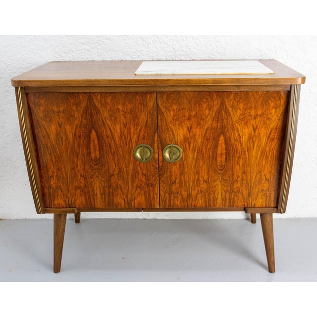 Buffet cocktail bar made from a sewing machine cabinet Walnut lacquered Marble has been inlaid at the sewing-machine...