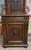 Antique piece of finely carved solid walnut furniture in the renaissance style, featuring a rich and balanced design. this...
