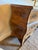 Masterfully crafted, the chest showcases a dramatically contoured, serpentine facade and gently swelling bombé sides,...