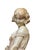 hand-carved alabaster figurative sculpture depicting a young woman or shepherdess with a goat/sheep, mounted on a...