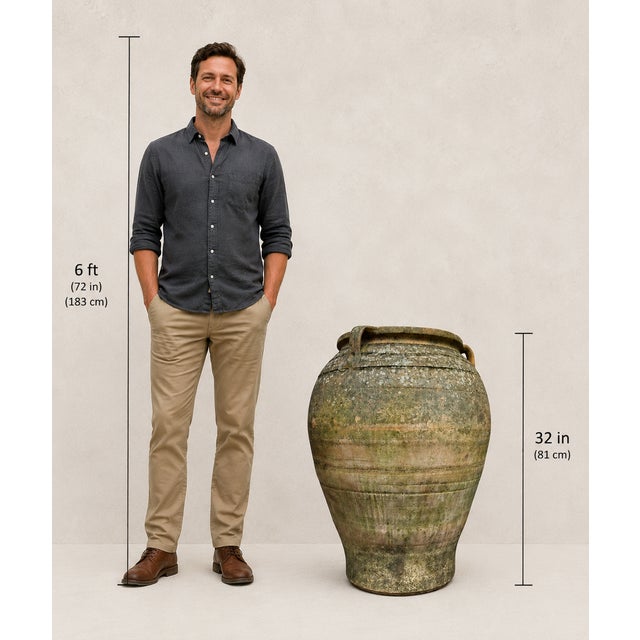 An exceptional pair of late 19th-century European (likely Greek) terracotta olive jars, dating to circa 1890. Their...