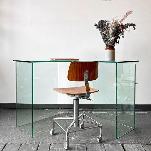Product: glass table style: vintage material: greenish glass features: two glass legs with a glass top condition: good...