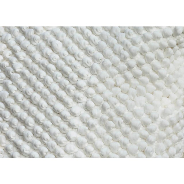 The Mushroom cover pillow in white is made of recycled cotton and linen from the waste of home textile products. As all...