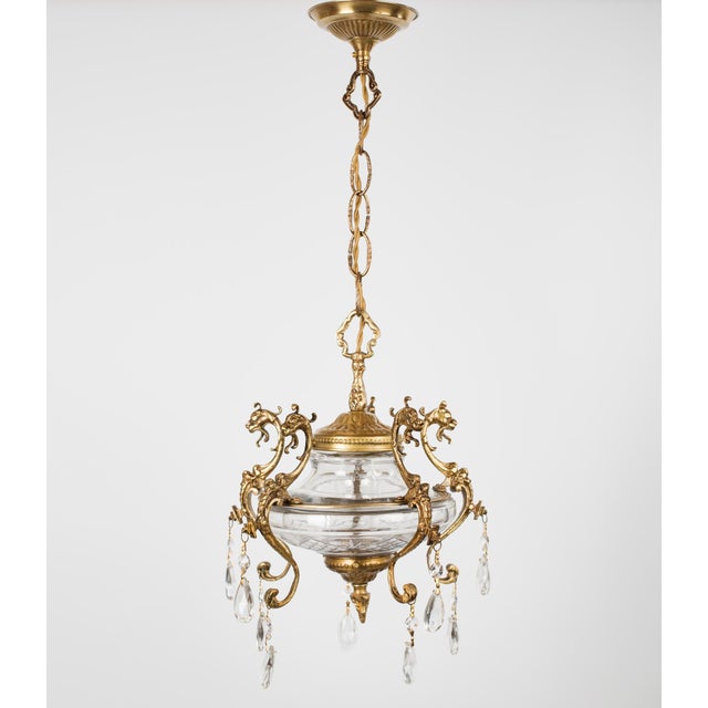 This exceptional pendant light is a rare find from early 20th-century Spain, embodying the dramatic flair and exquisite...
