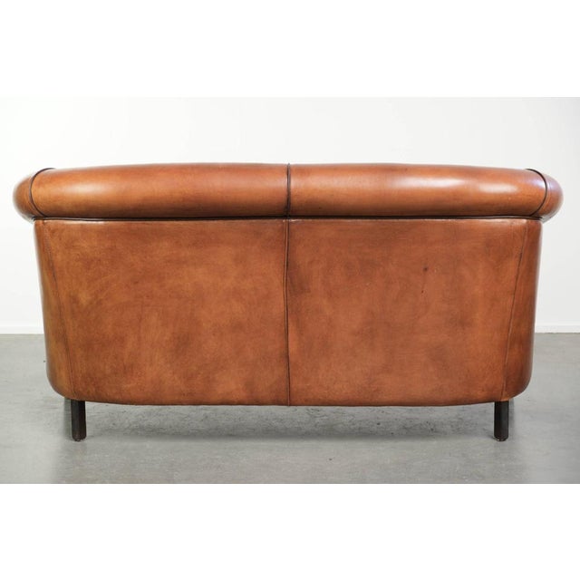 Sheepskin 2-Seater Sofa with Warm Cognac Brown Color Scheme and Finish with Black Piping For Sale - Image 3 of 15