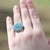 This is part of Chairish’s Fine Jewelry assortment. Estate custom diamond and turquoise platinum ring. This custom made...