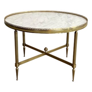 1940s Neoclassical style round brass coffee table with marble top Attributed to Maison Jansen For Sale