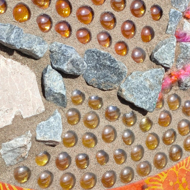 Made out of travertine, rocks, steel rods, pebbles, and concrete with a wood frame, we just had to snag it! Signed "Paul...