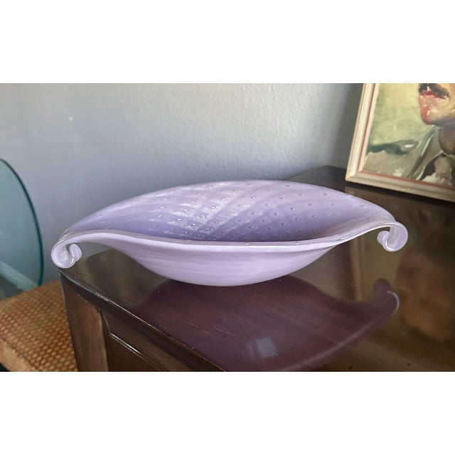 Vintage Murano Italian handblown lavender purple colored oval shape bowl or centerpiece by Alfredo Barbini. Inside the...
