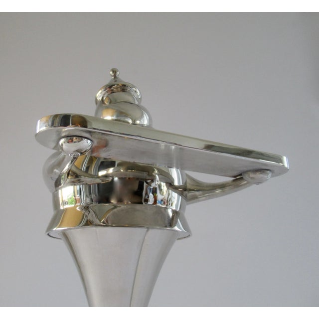 A tall, statuesque silver plated Santa Claus Candle holder is perfect for holiday displays. Rare and hard to find, this...