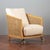 This armchair embodies the refined vintage design of the 1980s, with a structure that combines the warmth of wood, the...