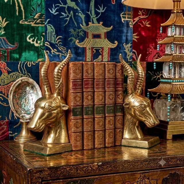 For the collector who believes that every book on a shelf deserves a monumental frame, we present this breathtaking pair...