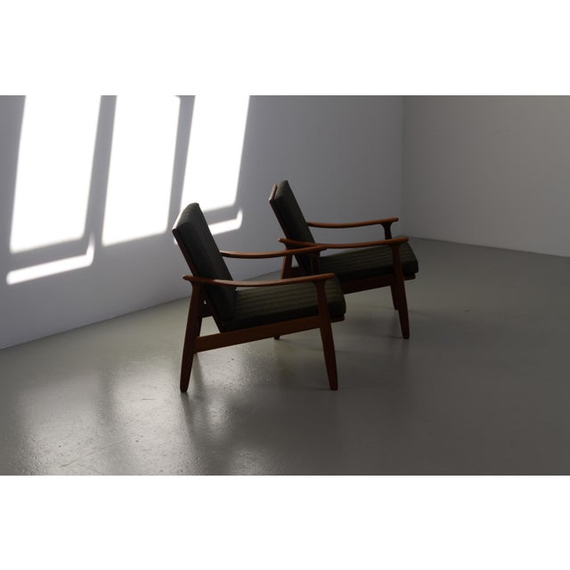 Danish modern teak lounge chairs, 1960s. Set of 2. pair of lovely scandinavian mid-century modern easy chairs in solid...