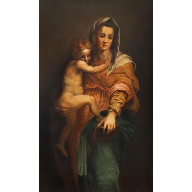 This is a beautiful Italian School oil on canvas painting after Raphael, depicting the Madonna and Child in it's original...