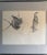 This is a framed reprint of Storing Up, a 1959 dry-brush work by Andrew Wyeth, one of the best-known American realist...