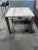 Sleek sophistication meets organic beauty in this Lexington Laurel Canyon “Stone Canyon” Side Table. The design pairs a...