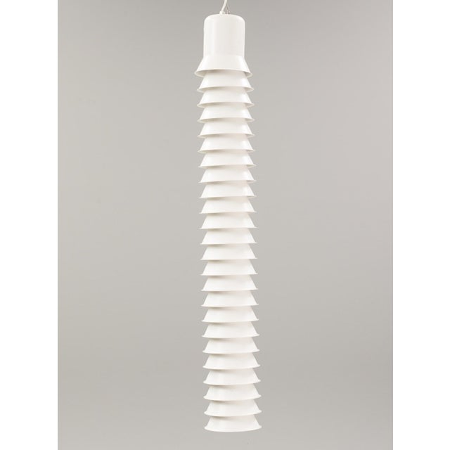 A hanging light by Asea Skandia, a model "8050B". Sweden, second half of the 20th century. White plastic diffusers with...