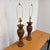 Design Plus Gallery presents Pair of Vintage Carved Wood Table Lamps. The lamps have sculpted bases that showcase the...