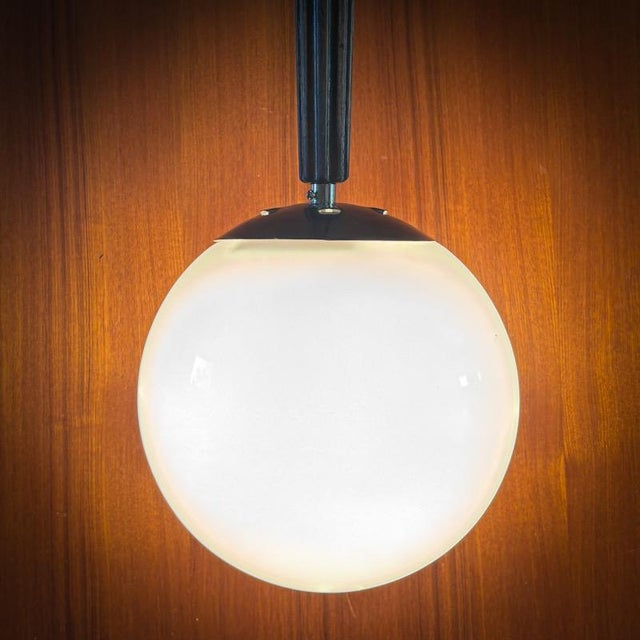 A Swedish Art Deco pendant lamp produced by an unidentified manufacturer in the 1930s. The fixture is constructed with a...