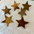 Decorate the table with a set of six vintage hammered brass star napkin rings. Each star measures 3” across, with a 1⅜”...