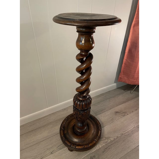 An exquisite hand carved and turned English Oak Open Barley Twist Pedestal Plant or Display Stand. Circa Early 1900s. This...
