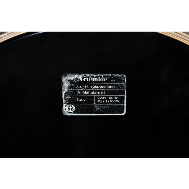 Chandelier in satin glass and lens, with lacquered metal structure. Egina ceiling light model Designer Angelo Mangiarotti...