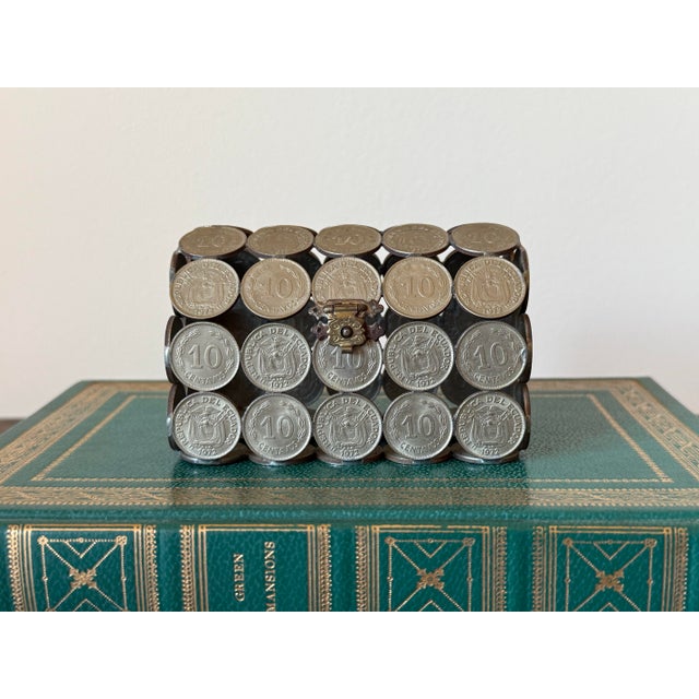 Midcentury Folk Art Peruvian brass coin box, made entirely from welded 10 centavos pieces. Lid is hinged with latch. Most...