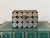 Midcentury Folk Art Peruvian brass coin box, made entirely from welded 10 centavos pieces. Lid is hinged with latch. Most...