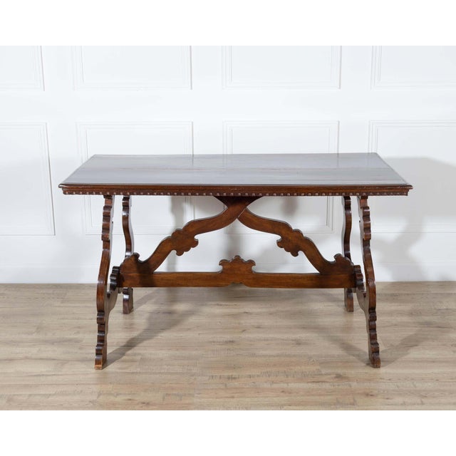 The 19th-century walnut fratino table perfectly blends sophistication and practicality. This magnificent piece is ideal...