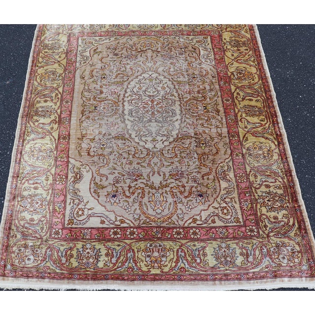 Ivory Antique Turkish Silk Hereke Rug With Floral Medallion Design and Ivory Field For Sale - Image 8 of 14
