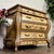 Hand-painted French Provincial–style bombe chest of drawers with a Venetian-inspired gold antiqued finish and carved...