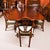 This is a fabulous vintage dining set comprising a regency revival dining table and a set of eight shield back dining...