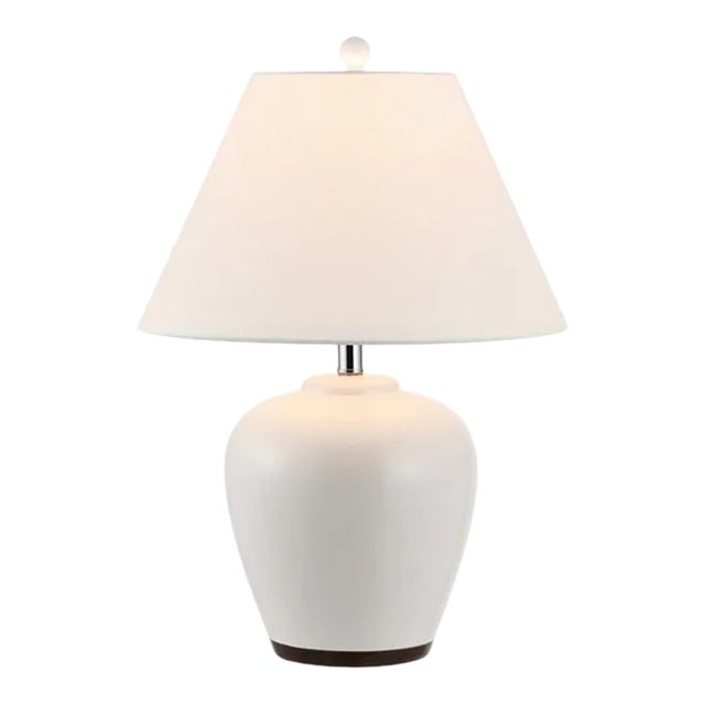Clean and contemporary, this Etren Table Lamp is sophisticated in its dignified modesty. Etren’s classically styled ivory...
