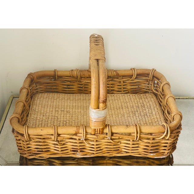 Large antique handmade wicker market boulangerie basket with grass woven padding.