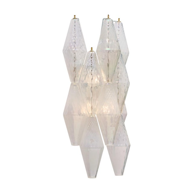 Pair of sconces from the island of Murano outside of Venice, Italy. These sconces feature geometric hand-blown glass...