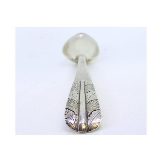 Silver Rice and Serving Spoon with Acanthus Leaves Embossed Handle, in Very Good conditions. Designed before 1890 This...