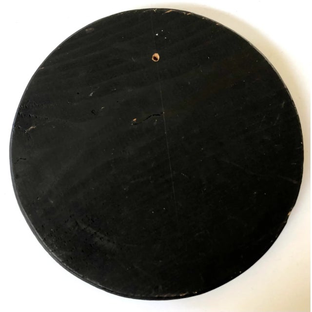 Charming trivet of a pair of lovers on this Danish porcelain plaque is mounted on a wooden disc to protect both table and...