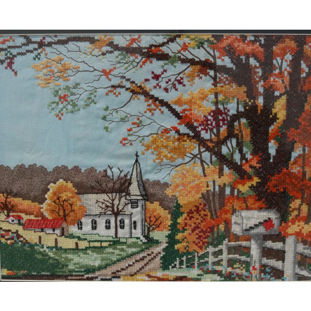 Nicely done cross-stitch art. Framed, under glass, with a white mat. Solid wood frame is from Mexico and accentuates the...